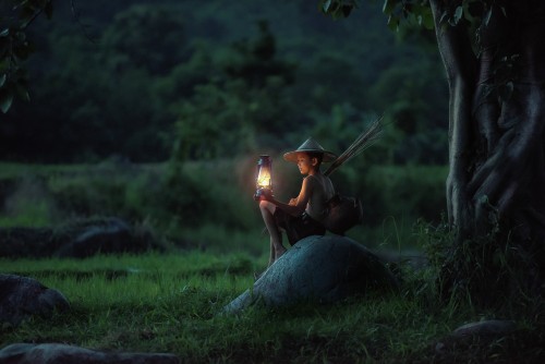 Boy-Sitting-Lantern-Outdoors-Asia-Vietnam-Dawn.jpg